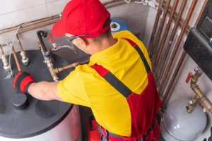 comparison of tankless and traditional storage tank water heaters in a commercial setting